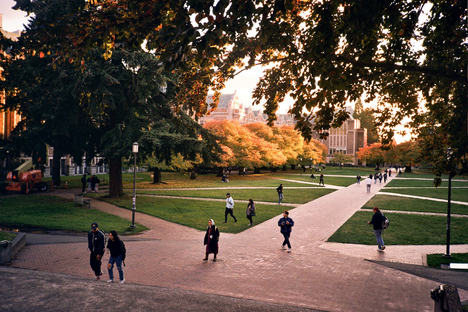 Student walking across a college campus